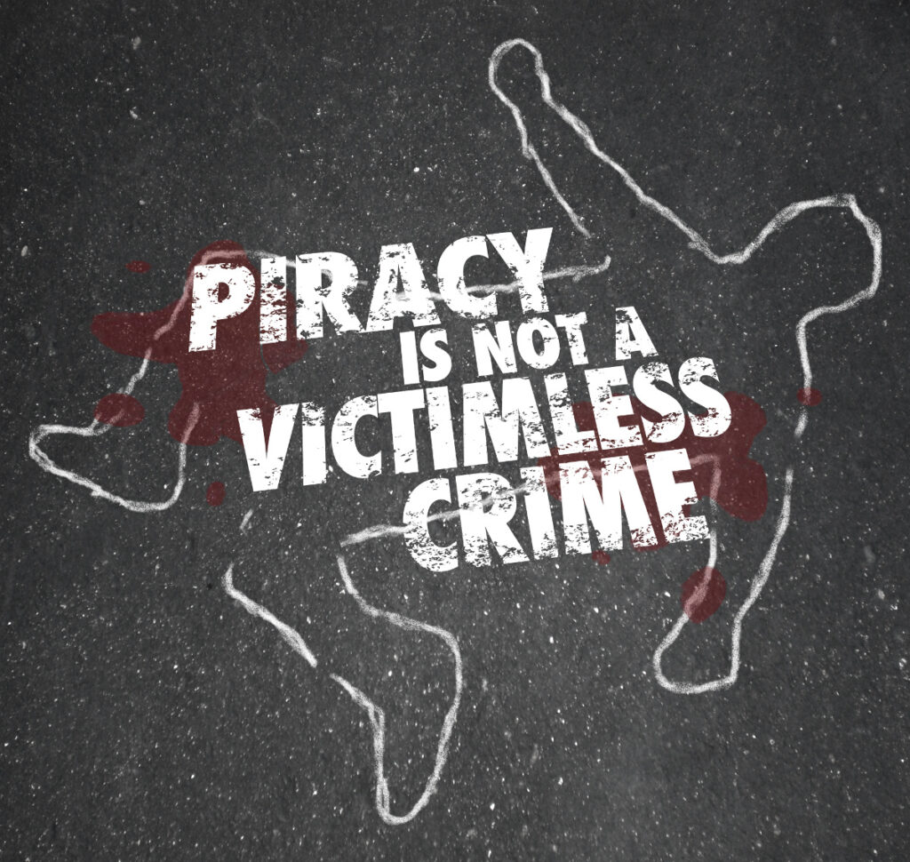 Piracy is Not a Victimless Crime words on a chalk outline of a dead body and blood on the pavement